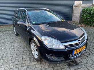 Voiture accidenté Opel Astra Astra H SW (L35), Combi, 2004 / 2014 1.6 16V Twinport 2009/11